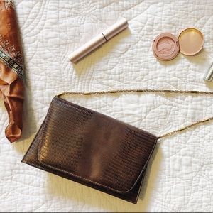 Snake skin textured Pleather Clutch